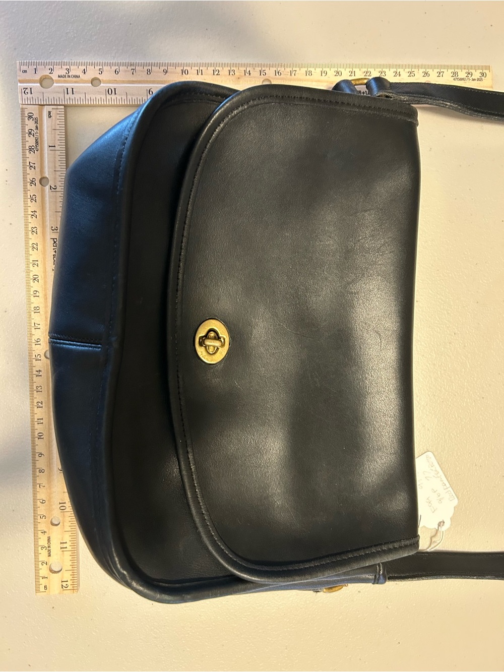 Coach Vintage City BagClassic Black Leather Crossbody Bag with Turn-Lock Closure